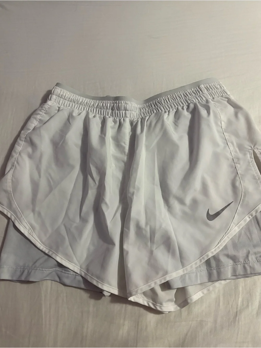 Nike Women’s White Athletic Running Shorts with Silver Swoosh